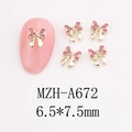 Detail of 6.5x7.5mm golden bow nail charms with pink rhinestones for DIY manicure art - Tiny Bow Style (A672)