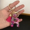 Llavero letra R de resina rosa con piedras, borla y bola de lentejuelas de estrellas doradas - Cierre De Borla De Bola Pequeña / Letra R