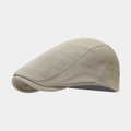 Vista lateral de la gorra plana beige que muestra la textura de algodón y diseño vintage - Ajustable / Caqui