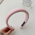 Pink padded headband with glossy fabric finish and handmade label for women - Pink