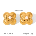 Detail view of gold flower earrings with pearl center and brushed metal texture - Brushed Floral (HC-E10678)