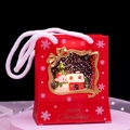 Red Christmas gift bag with clear window showing snowman scene and gold Merry Christmas text - Handbag Style Snowman and House