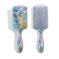 Detail of transparent square hairbrush with holographic butterfly sequins and blue leaf pattern - Green Leaf Style