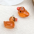 Zwei orangefarbene 3D-Leuchthentel-Anhänger aus Harz für DIY-Schmuck und Schlüsselanhänger - 20x21mm / Orange