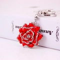 Sparkling red enamel rose keychain with crystal rhinestones on a metal floral pendant - Red