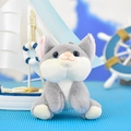 Detailed view of a cute grey and white plush cat toy pendant in nautical setting - Gray / 12cm