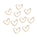 Flat lay of white enamel heart charms with gold beaded edges for DIY jewelry making - Heart-shaped Beaded Style / White