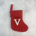 Red knit Christmas stocking with white plush letter V embroidery and hanging loop - Letter V
