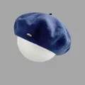 Classic dark blue wool beret featuring a golden oval metal logo on a foam head model - M (56-58cm) / Navy Blue