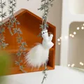 White faux fur squirrel Christmas ornament with pinecone and 14cm hanging height - White Squirrel Holding Pine Ball