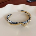 Irregular golden open bangle featuring a double-layered zebra print enamel design - 57# Zebra Pattern Double-Layer Interleaved Arc Style / Gold Black White