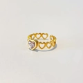Detail van 18k gouden hartring met zirkonia inleg en opengewerkt ontwerp - Verstelbaar Open / Lichtroze