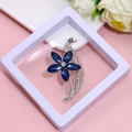 Elegant silver-toned flower brooch with deep blue petals and sparkling rhinestones - XZ061-Blue Gem Flower-Boxed