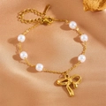 Gold stainless steel pearl bracelet with elegant ribbon bow pendant for women - Bow Bracelet