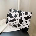 Chic black and white cow print envelope clutch bag with wristlet strap in PU leather - Black Cow Print