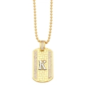 Macro detail of gold-plated K letter pendant with micro-pave cubic zirconia stones - Letter K