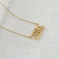 Collier en acier inoxydable plaqué or 18 carats avec pendentif gothique année 2004 - 2004