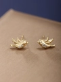 Golden bird-shaped stud earrings with zircon stones on a silk background - Flying Bird (136)