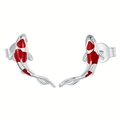 Detailed close-up of lucky koi fish earrings with red enamel and zircon stone inlay - White Gold