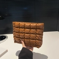Brown quilted puffy cloud cosmetic bag in glossy faux leather handheld style - Brown