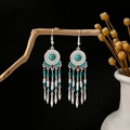 Bohemian silver earrings with blue turquoise beads and ethnic multi-color tassels - Blue