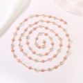Close-up of pink daisy charm necklace with gold chain and sparkling rhinestones - Pink Daisy 6mm Rhinestone Chain (Style 11) / Length approx. 1m