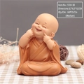 Cute nodding monk car dashboard figurine, medium size resin monk in orange robe - Finger to Cheek Smiling (Medium Size)