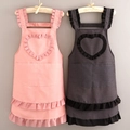 Pink and black polka dot canvas aprons with stylish ruffle details and heart-shaped chest design - Canvas Heart Ruffles - Black + Pink Dots Set