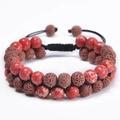 Close-up of double-layer braided bracelet with red marble beads and volcanic lava stones - Red Marble Texture + Brown Lava Rock