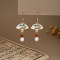 Macro detail of Chinese style fan-shaped earrings with green bamboo pattern and pearls - Fan-shaped White Bamboo Red Bead Pearl Style (E6412)
