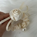 Detail of cream satin scrunchie featuring a large rose flower and pearl charm pendant - Rose Pearl Ribbon Style / Beige