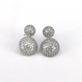 Detail of silver double ball earrings with micro-pave crystals in a minimalist style - Silver Double Ball