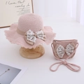 Detailed view of pink straw hat and matching crossbody bag with lace bows for girls - Pink Jewelry Set