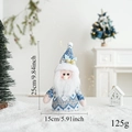 Blaue Strick-Weihnachtszwerg-Figur mit Maßen 25x15 cm in gemütlicher Festtagsszene - Blau Weihnachtsmann