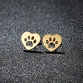 Minimalist gold hollow cat paw heart stud earrings in stainless steel on a dark texture - 439 Gold (Heart Paw)