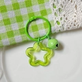 Green transparent star acrylic keychain with matching bell and green metal ring - Translucent Green