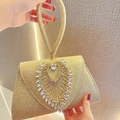 Champagne gold evening clutch with heart-shaped rhinestones and round metal handle - Gold