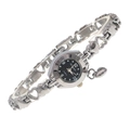 Detail of silver heart-shaped bracelet watch with black dial and dangling heart charm - Silver/Black Dial