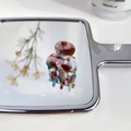 Mini marble acetate hair claw clip with brown and cream textures on mirror surface - Floral Brown