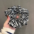 Stylish black and white zebra pattern linen scrunchie held in hand for hair accessory - 15# Zebra Print Black