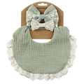 Detailed view of green cotton baby bib with lace trim and matching bow headbands - Grass Green