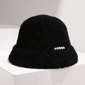 Detailed view of black plush bucket hat with thick fleece and decorative silver pearls - Black