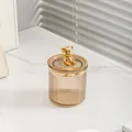 Bernsteinfarbenes Glas-Kosmetikglas mit vertikalen Streifen und goldenem Bärendeckel - Bernstein mit goldenem Bären
