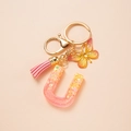 Pink gradient letter U keychain with sequins, gold butterfly charm and tassel - Letter U