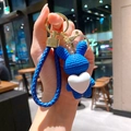 Cute blue knitted rabbit keychain featuring a white heart and matching braided strap. - Rabbit (B255-12) / Single Piece / Blue