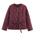 Detailed view of the diamond-quilted jacket collar featuring size S label and drawstring - S / Burgundy