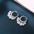 Elegant silver hoop earrings with clear cubic zirconia dangles on deep blue silk fabric - Multi-Color Pendant Style / Silver White Zircon
