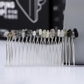 Macro detail of silver hair comb featuring hand-bound black and clear crystal stones - Black Rutilated Quartz + 20-Tooth Silver Comb