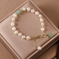 Freshwater pearl bracelet with green jade beads and gold T-bar toggle clasp - Green Style Natural Pearl Bracelet
