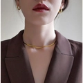 Elegant gold-plated titanium snake bone choker necklace worn by a fashion model - 4mm Single Gold 36+8cm